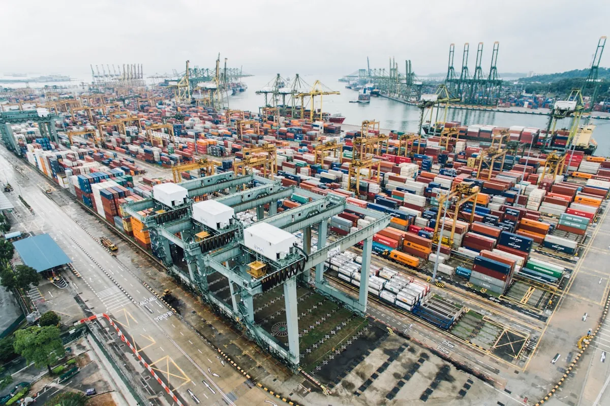 Container port terminal with cranes handling shipping cargo
