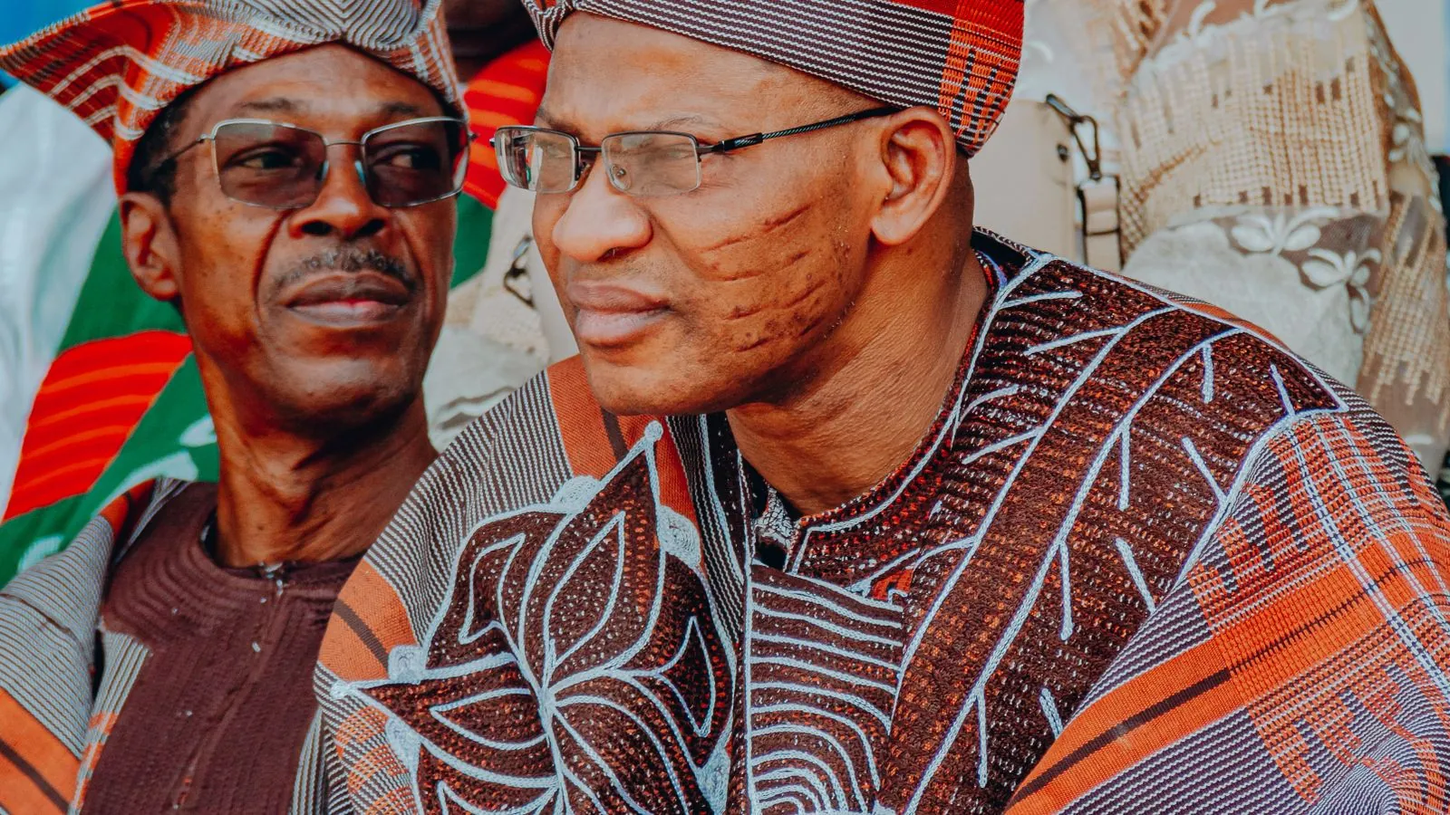 Nigerians dressed in traditional attire at a celebration