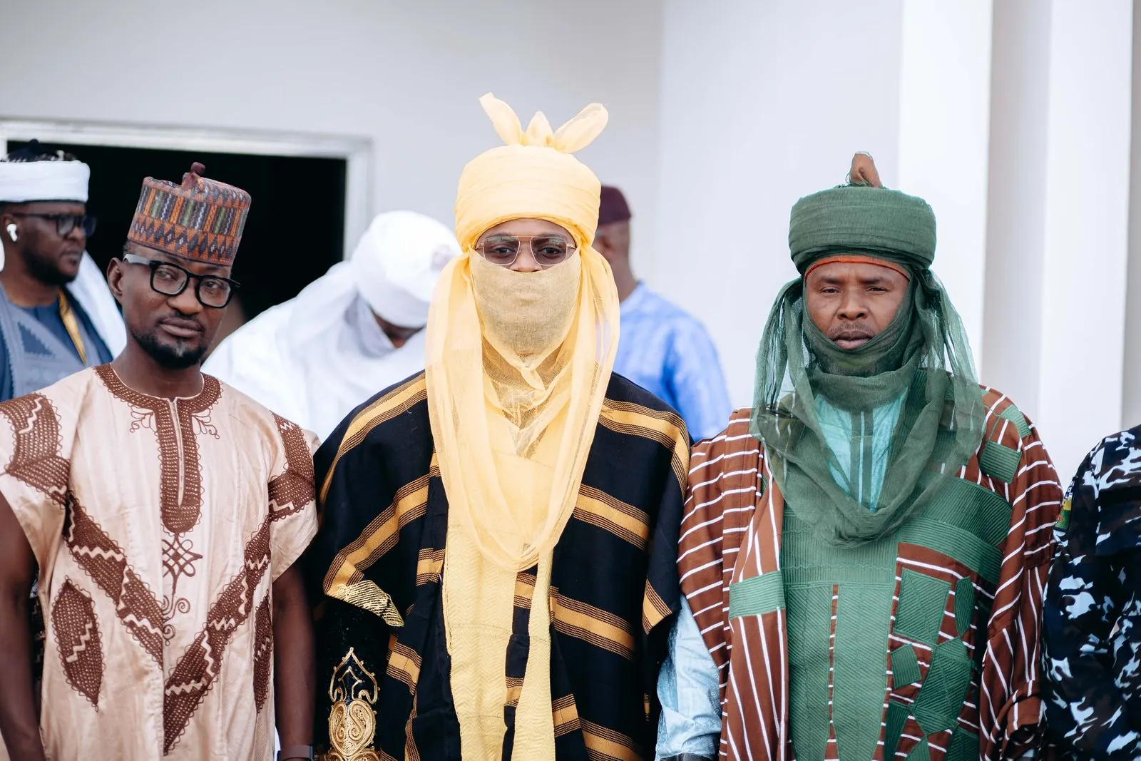 Nigerian people in traditional attire at a community gathering
